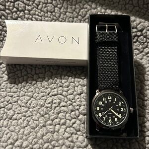 Black AVON military style canvas strap watch. New in box.